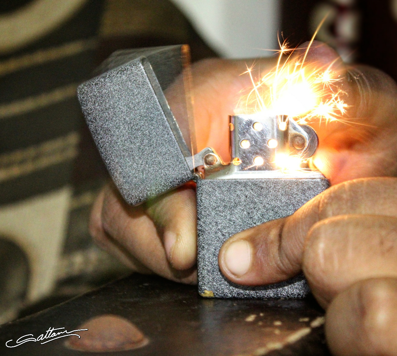 Zippo lighter photo with low spark. Sattam photography